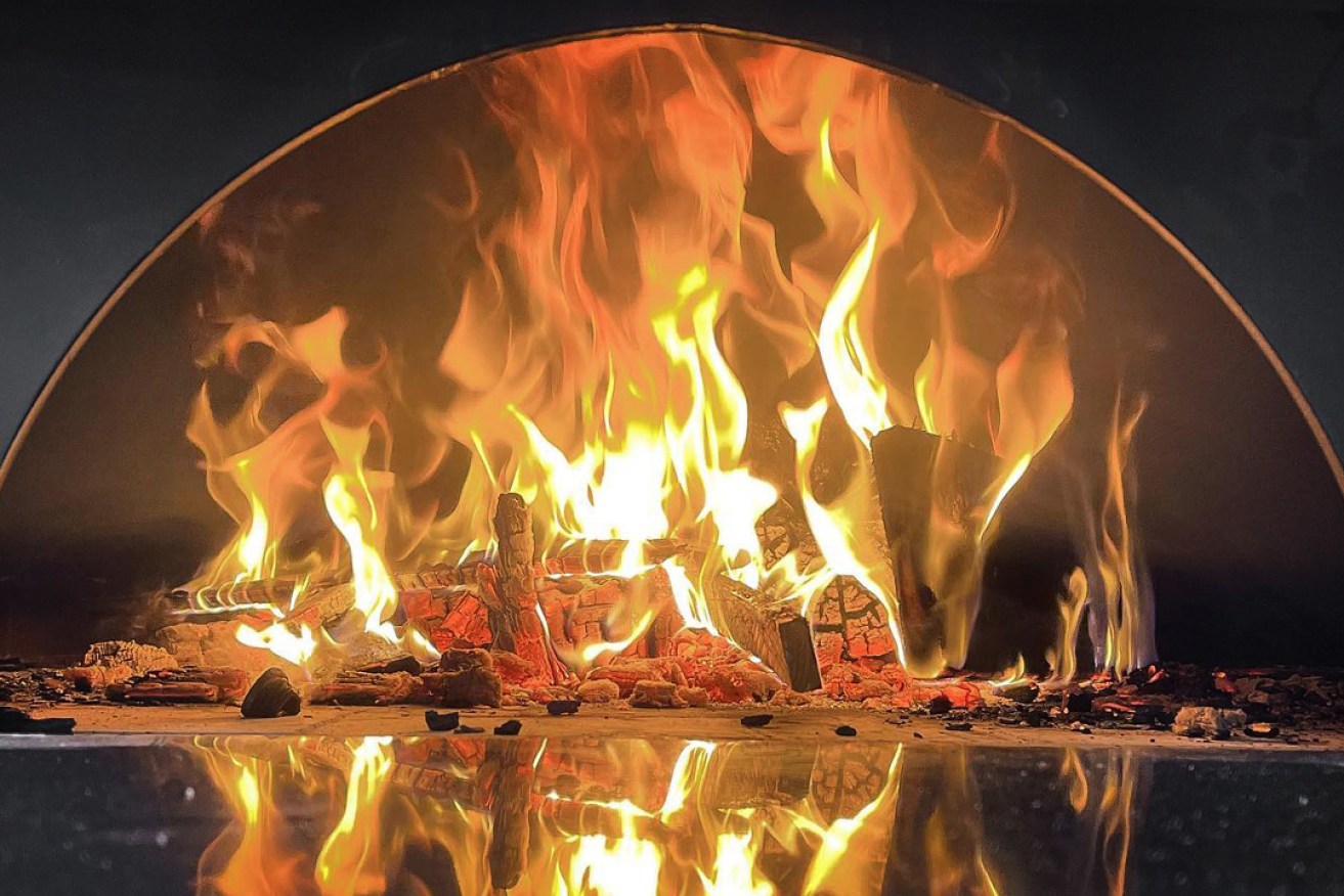 A wood-fired oven is at the heart of The Alchemists' Kitchen. Photo: Supplied