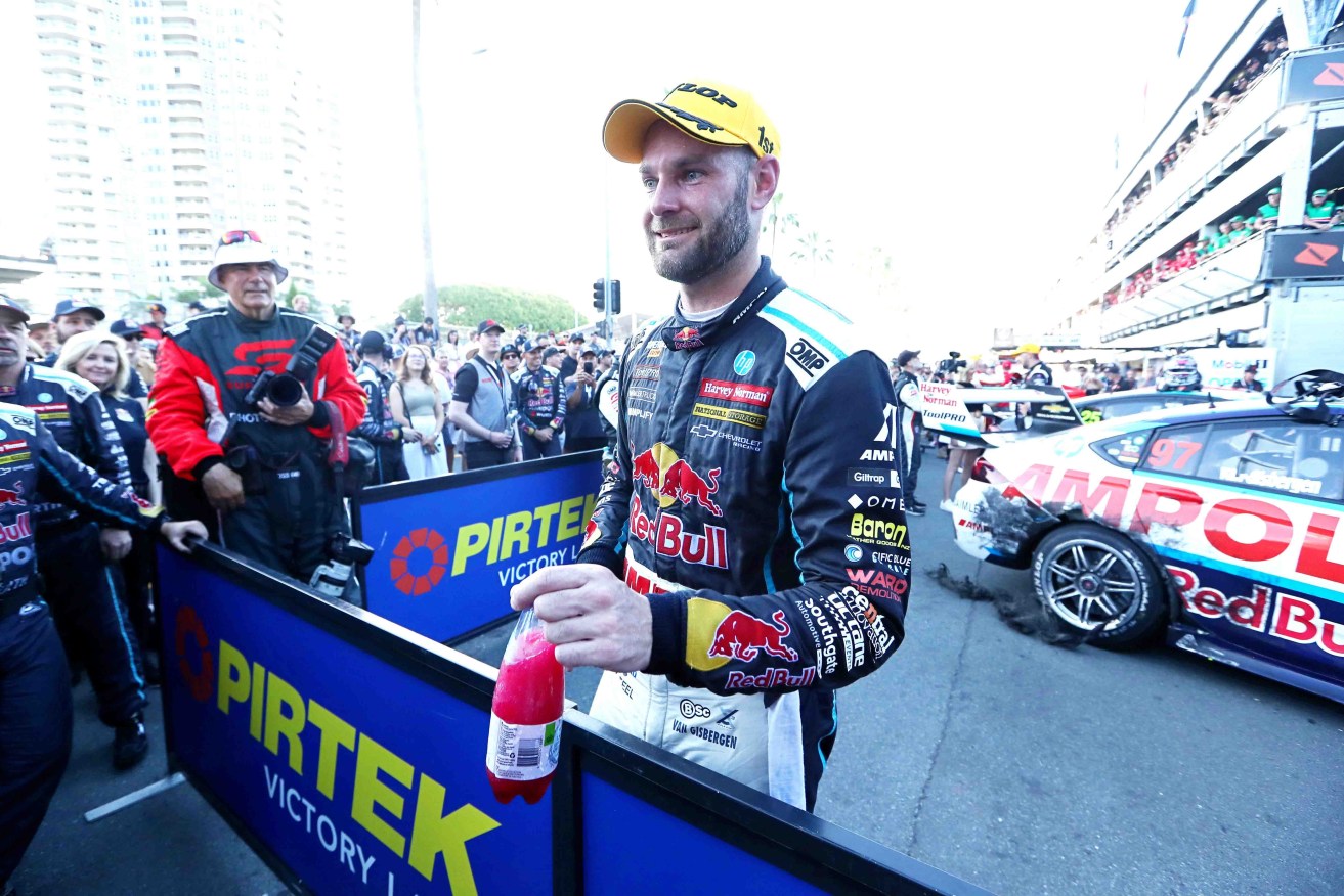 Shane van Gisbergen (pictured after the Gold Coast even in October) has celebrated his return to Adeaide's street circuit with a hot time. Photo: AAP/Jason O'Brien