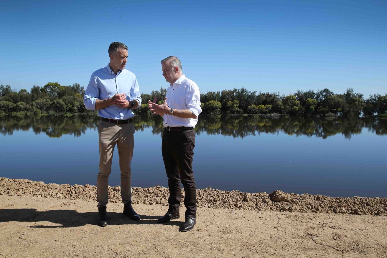 Long week: Prime Minister Anthony Albanese (right) and Premier Peter Malinauskas in Renmark last weekend. Since then, the PM has come down with COVID and the pair have clashed over nuclear power. Photo: AAP/Dean Martin
