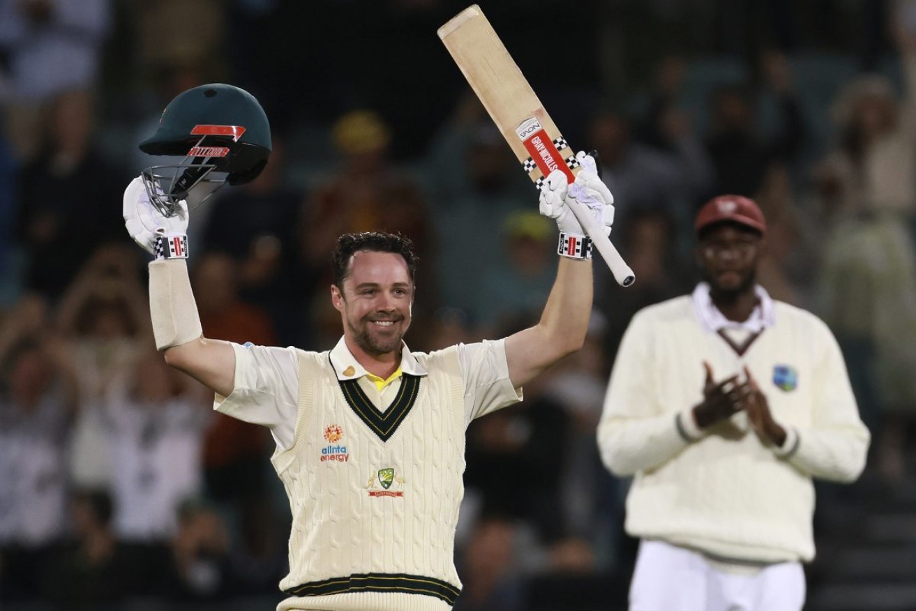 Travis Head celebrates making a century against the West Indies. Photo: AP/James Elsby