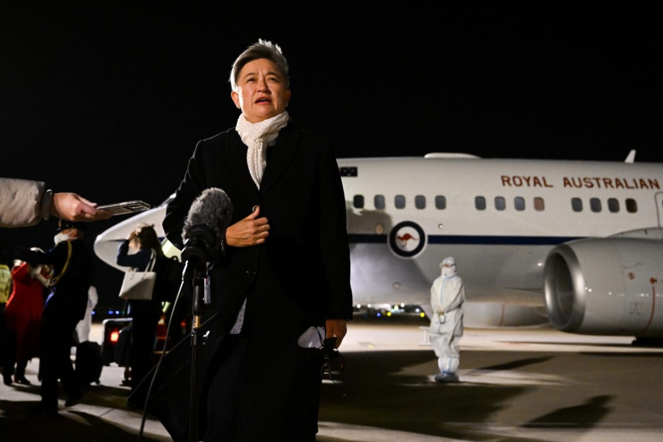 Australian Foreign Affairs Minister Penny Wong speaks to media after arriving in Beijing. Photo: AAP/Lukas Coch
