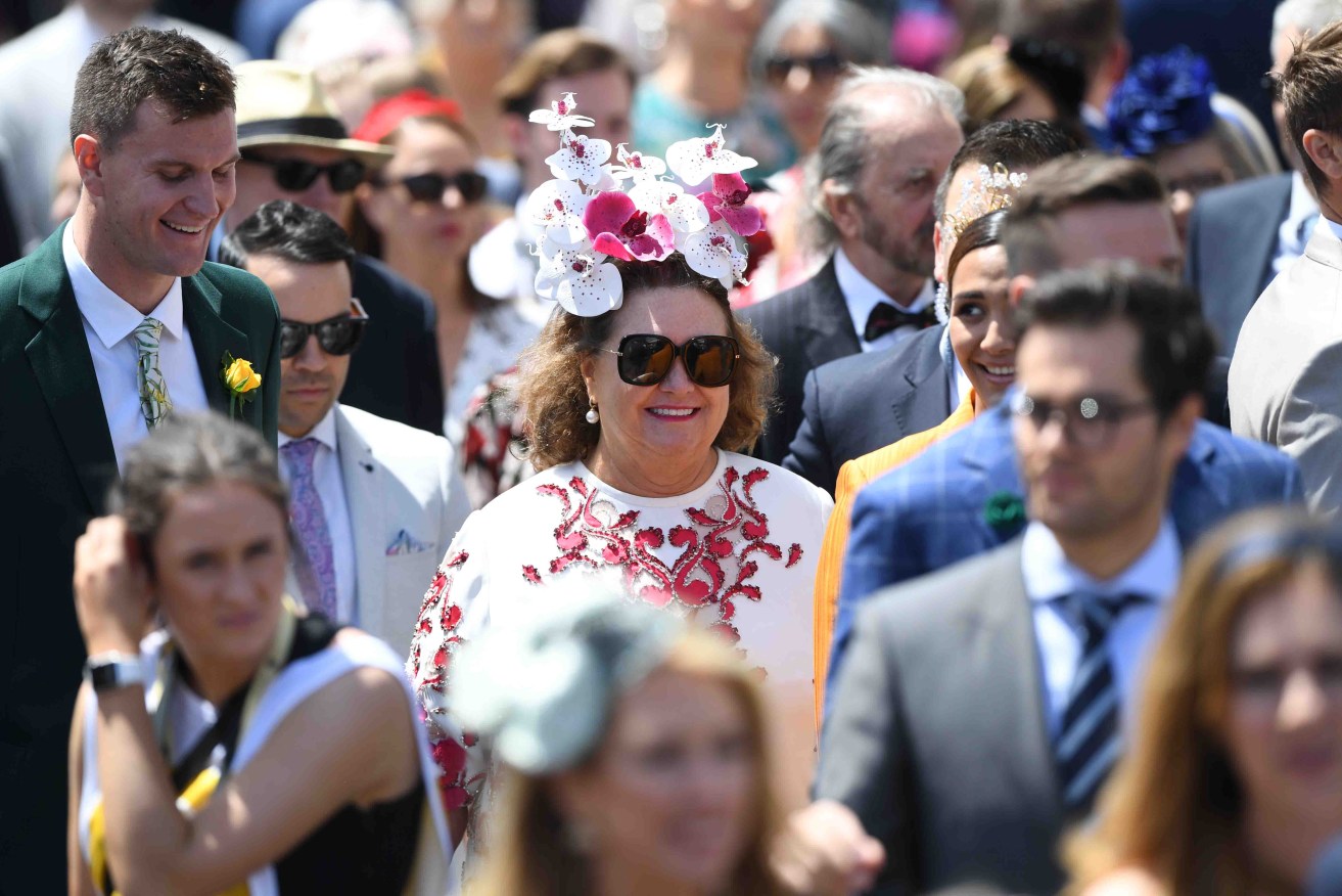 Australia's richest person Gina Rinehart (centre) at the Melbourne Cup. Photo: AAP/Julian Smith