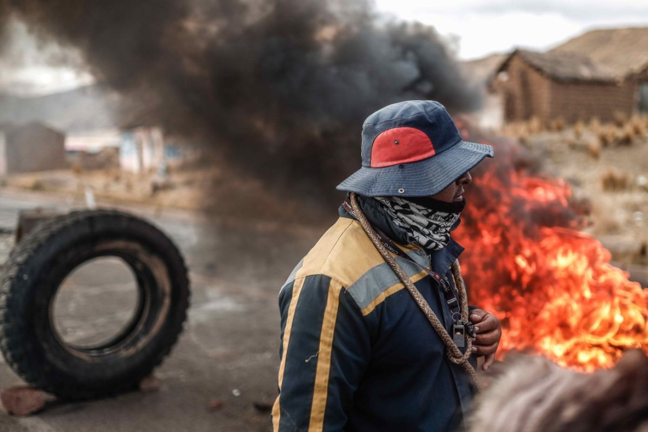 A political protest in Peru. EPA/Aldair Mejia