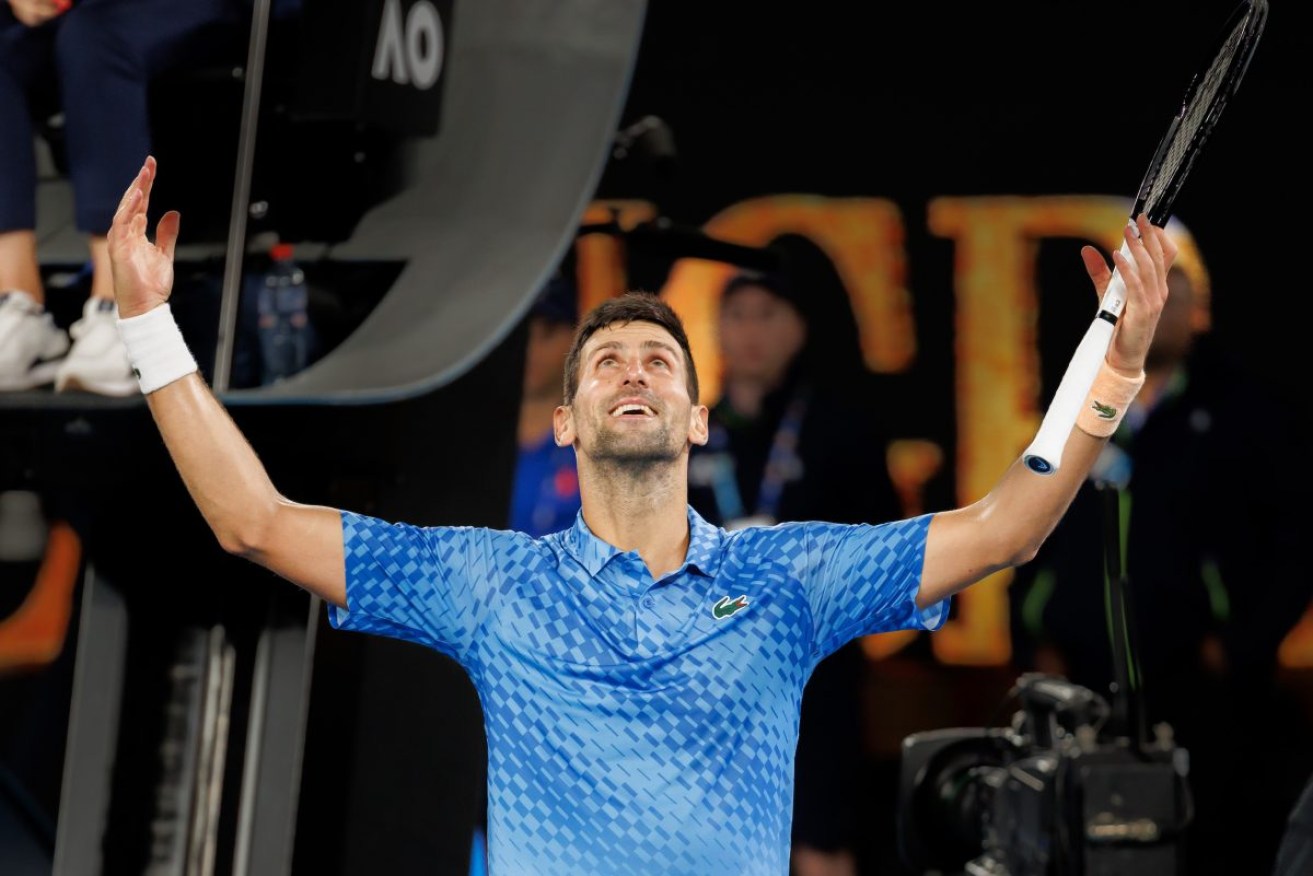 Novak Djokovic celebrates a 10th singles crown on Rod Laver Arena. Photo: Sydney Low/Cal Sport Media/Sipa USA/AAP