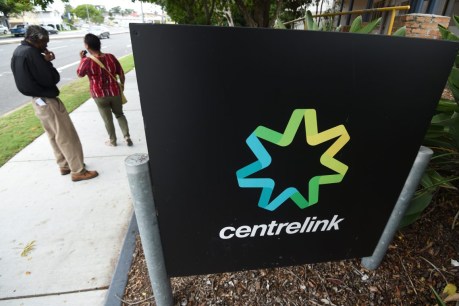 On hold: Centrelink call waiting times blow out amid demand
