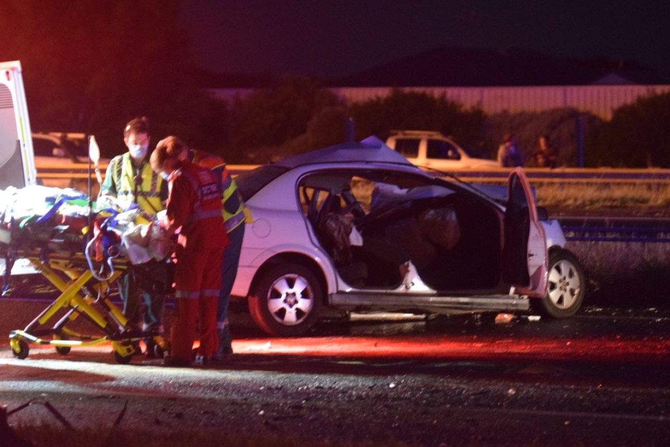 A person is attended to by paramedics at a crash scene in Adelaide. Photo: Supplied