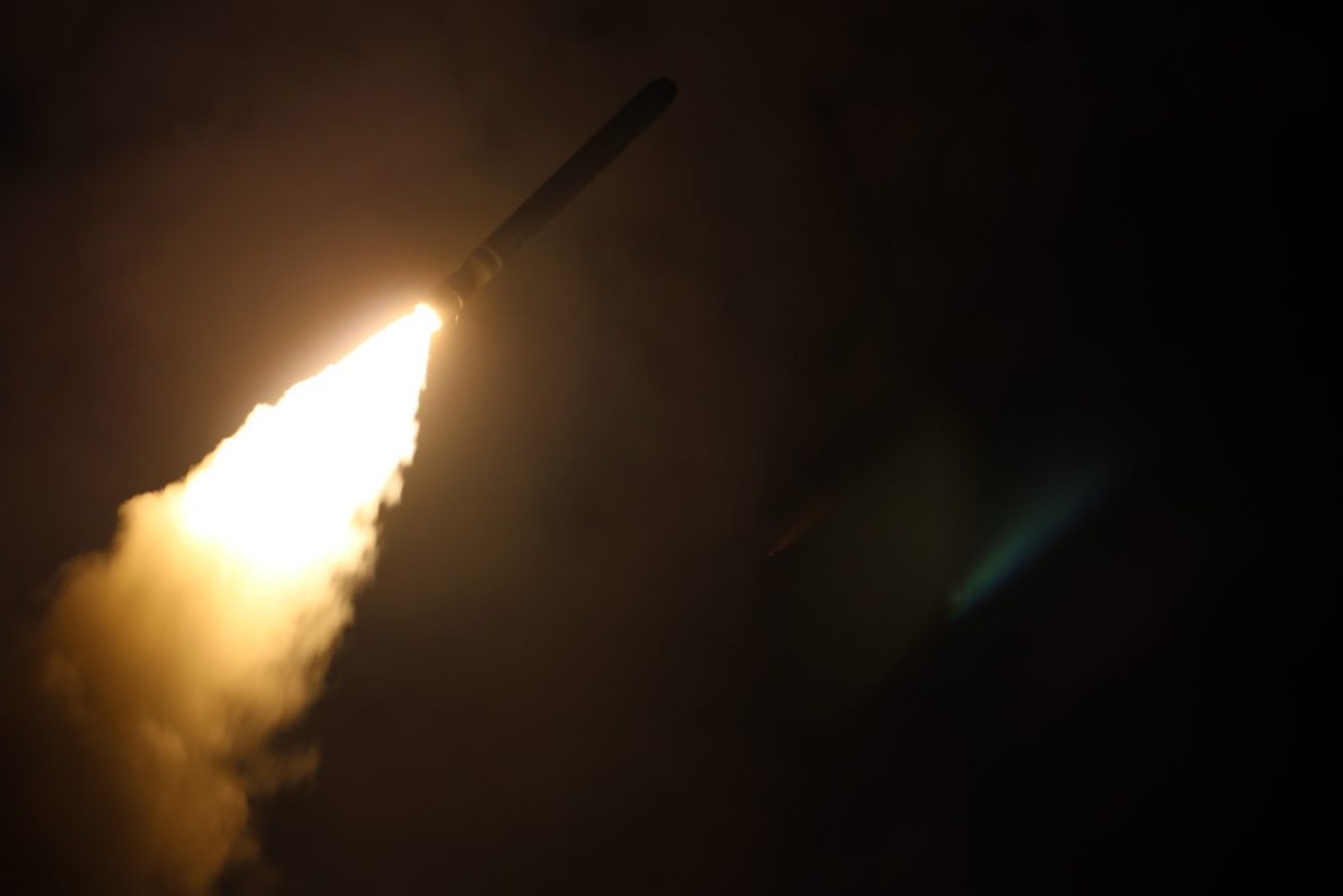 A Tomahawk missile is launched by a US destroyer. Photo: AAP/US  Navy