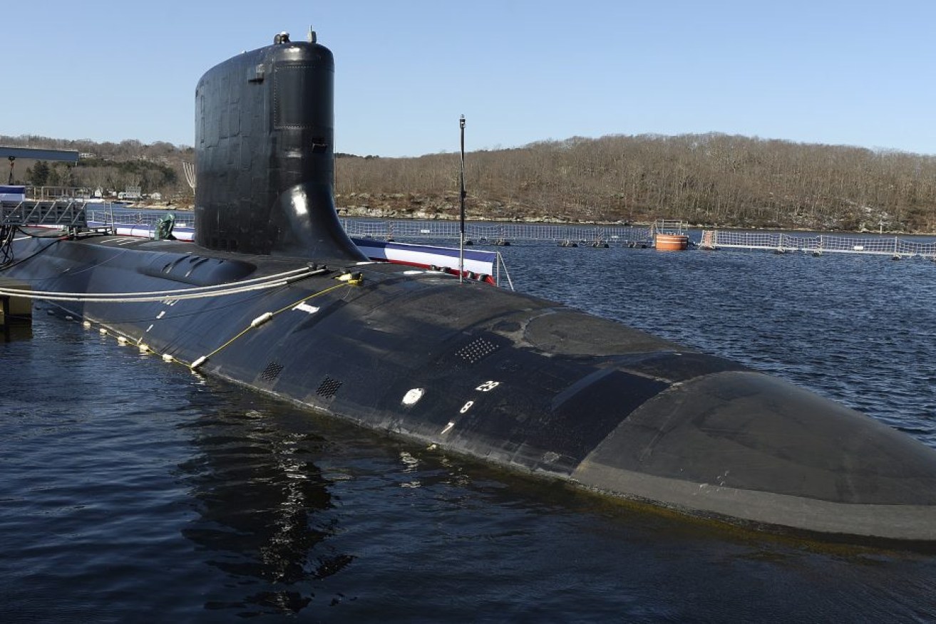 Australia will buy US Virginia-class nuclear submarines under the AUKUS deal. Each boat's reactor weighs around 100 tonnes, including about 200 kg of weapons grade enriched uranium. Photo: AAP
