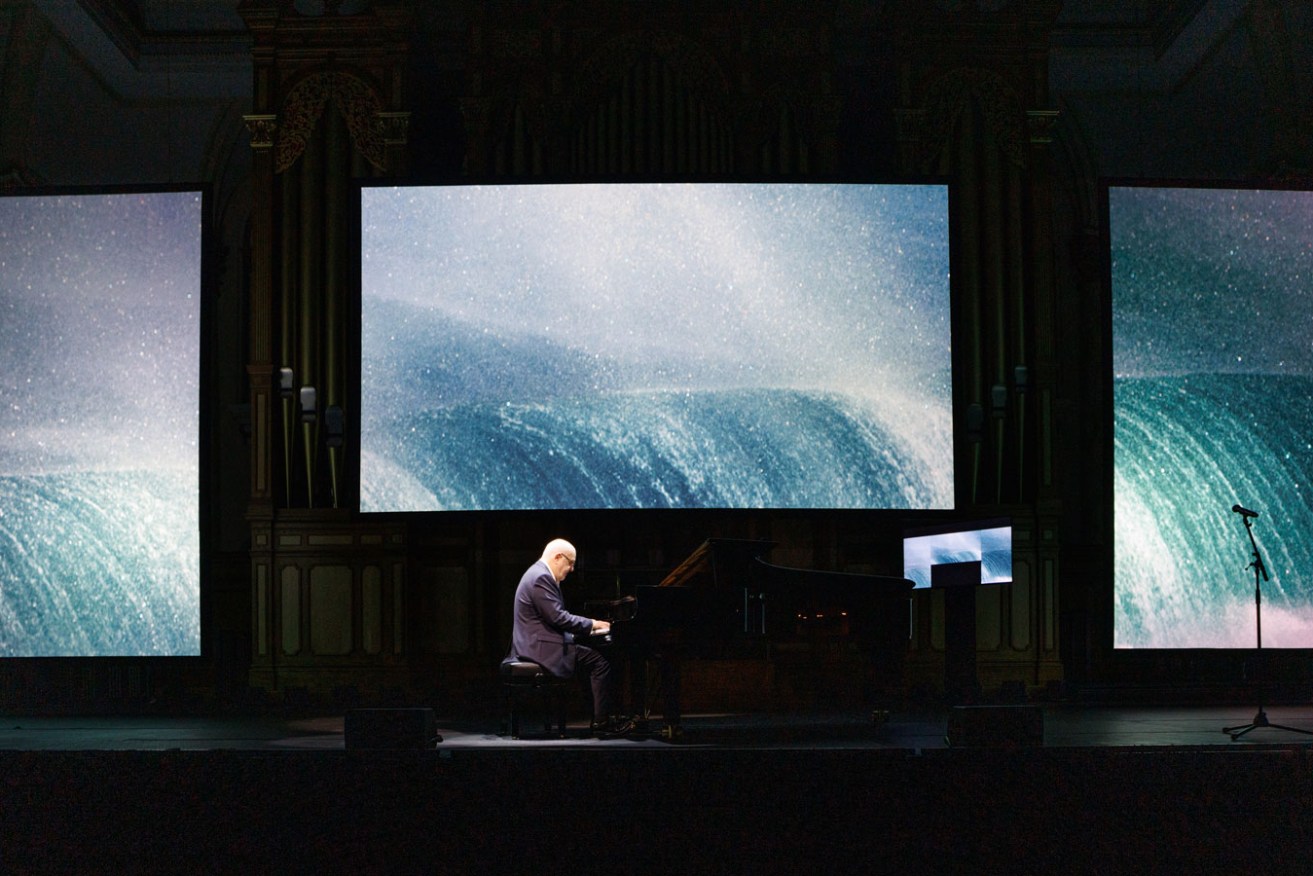Paul Grabowsky gives musical voice to Alex Frayne's projected landscapes in 'Music for Other Worlds'. Photo: Tony Lewis