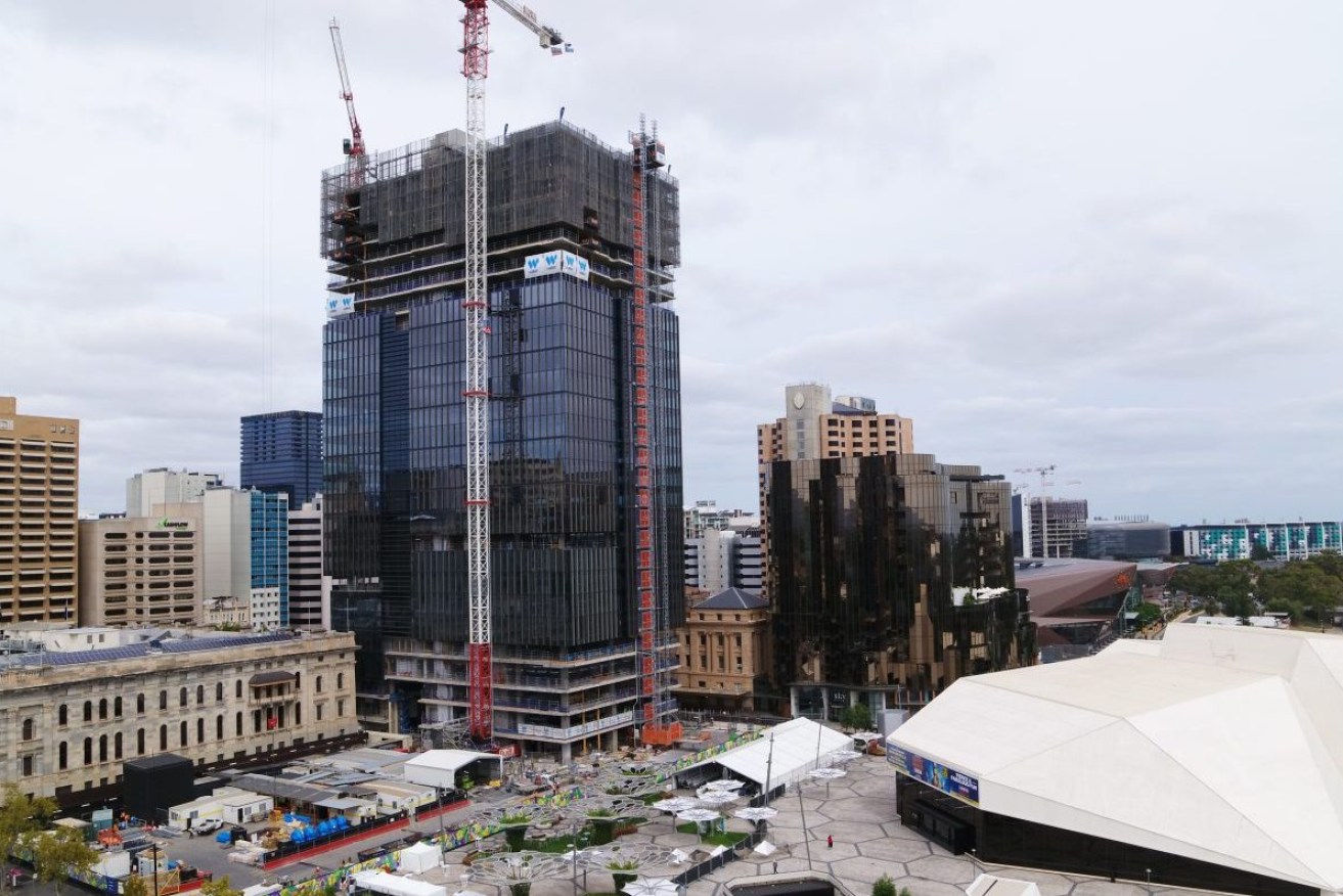 Walker Corp has submitted a proposal to build a second tower behind Parliament House, next to its 29-storey "One Festival Tower" under construction. Photo: Walker Corp