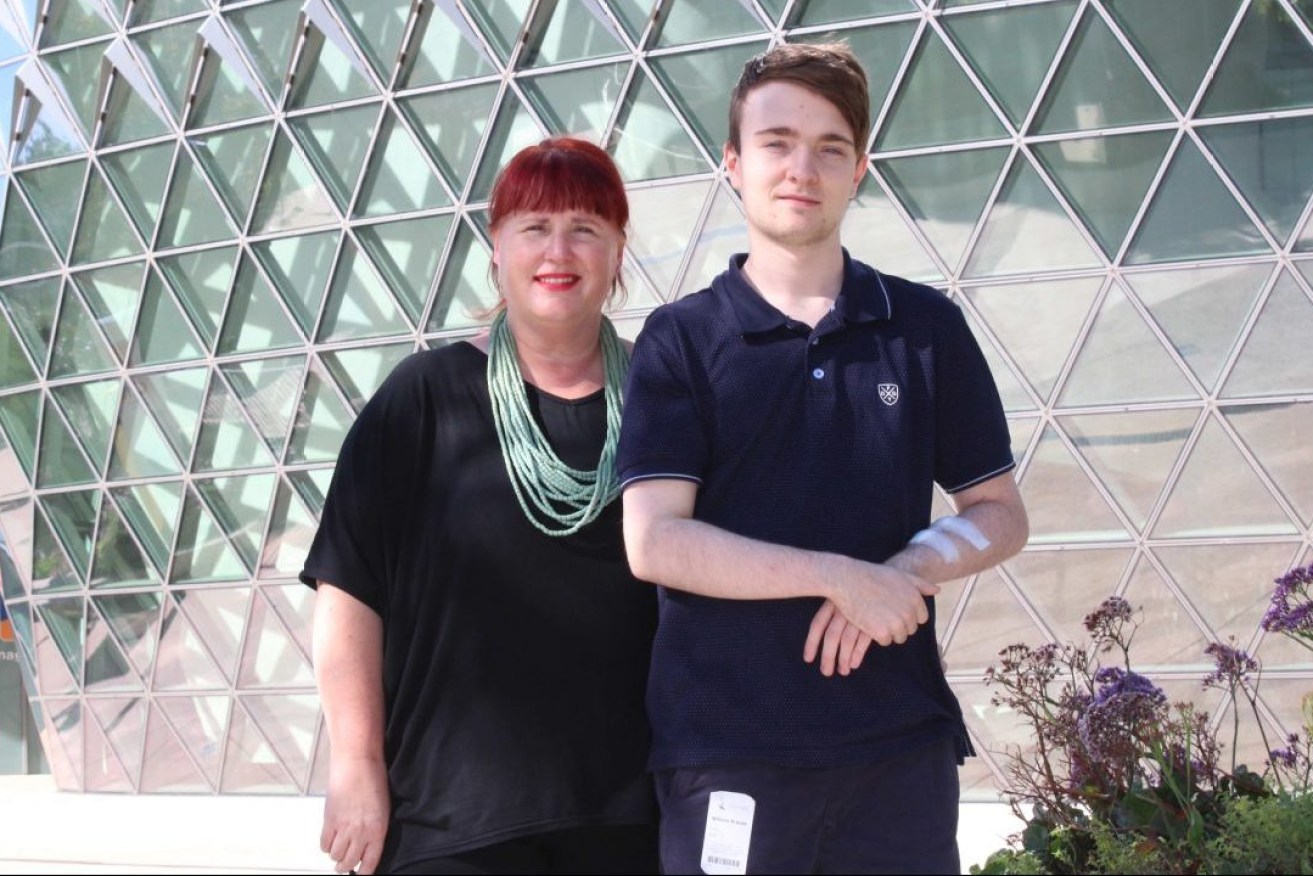 Deb Krauss with her son William, who say they have benefitted from SAHMRI's research