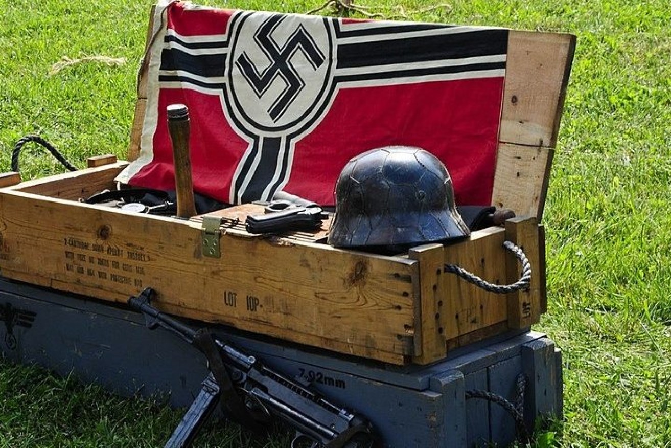 File photo: A Nazi flag and replica World War II-era military equipment at a historical re-enactment event in Indiana, USA, in 2008. South Australian military collectors and re-enactors have expressed concern about a draft Bill to ban Nazi symbols from public display. Photo: Wikimedia Commons