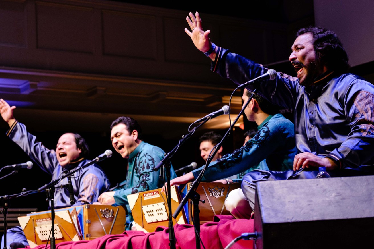 Brothers Rizwan and Muazzam lead a seven-member ensemble performing traditional Qawwali music.
