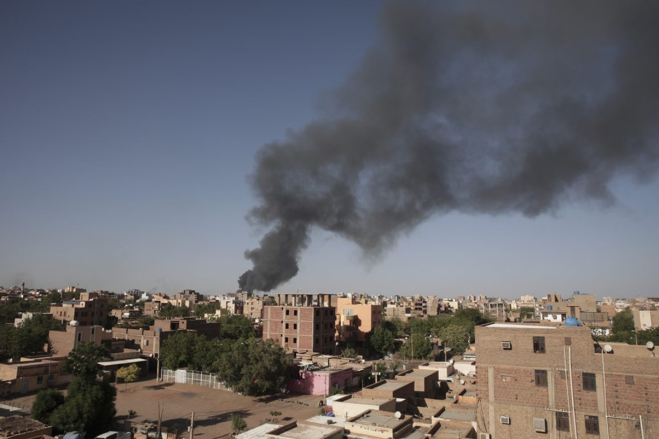 Smoke over Khartoum, Sudan. Photo: AP/Marwan Ali