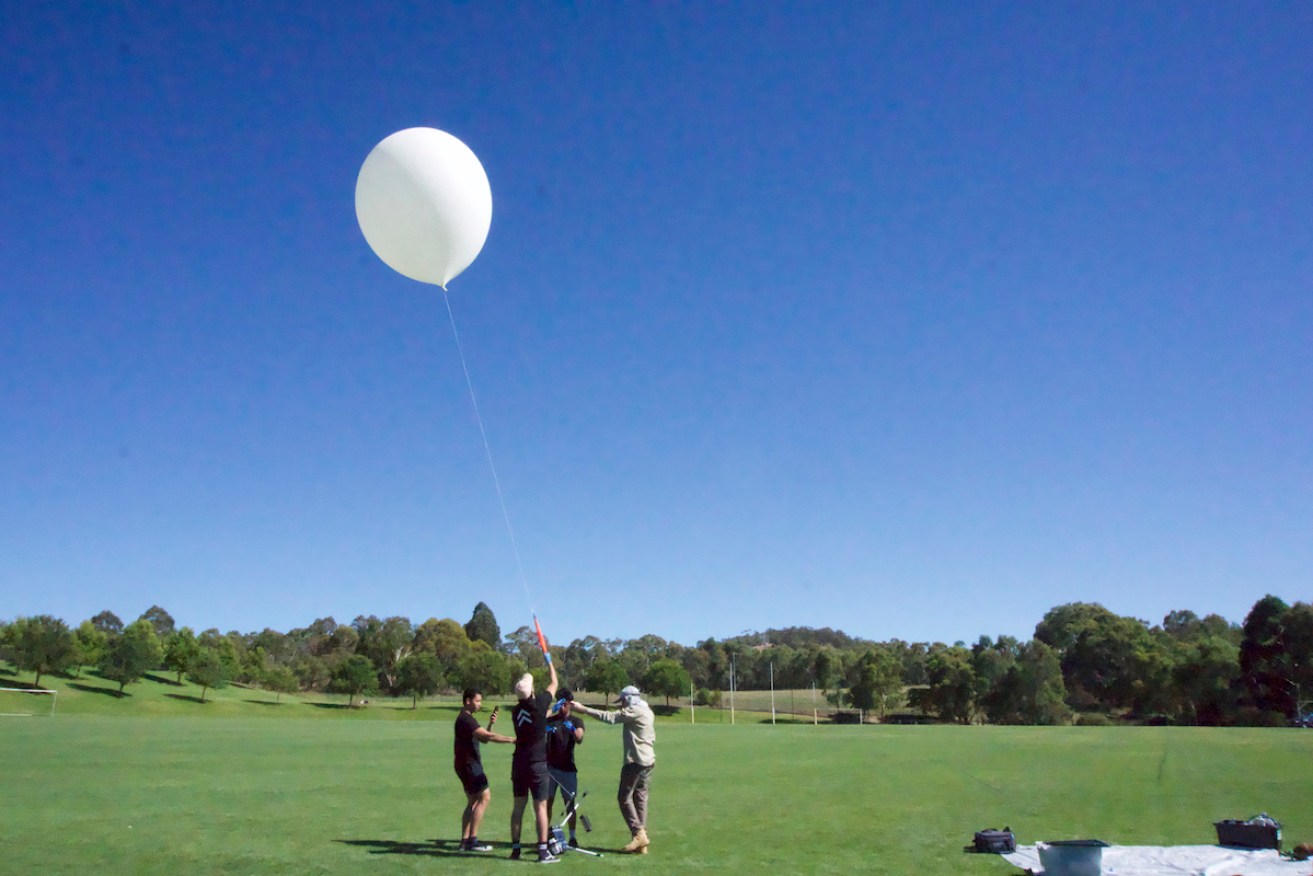 The Up&Up team launching a balloon into space last year. Photo: Supplied.