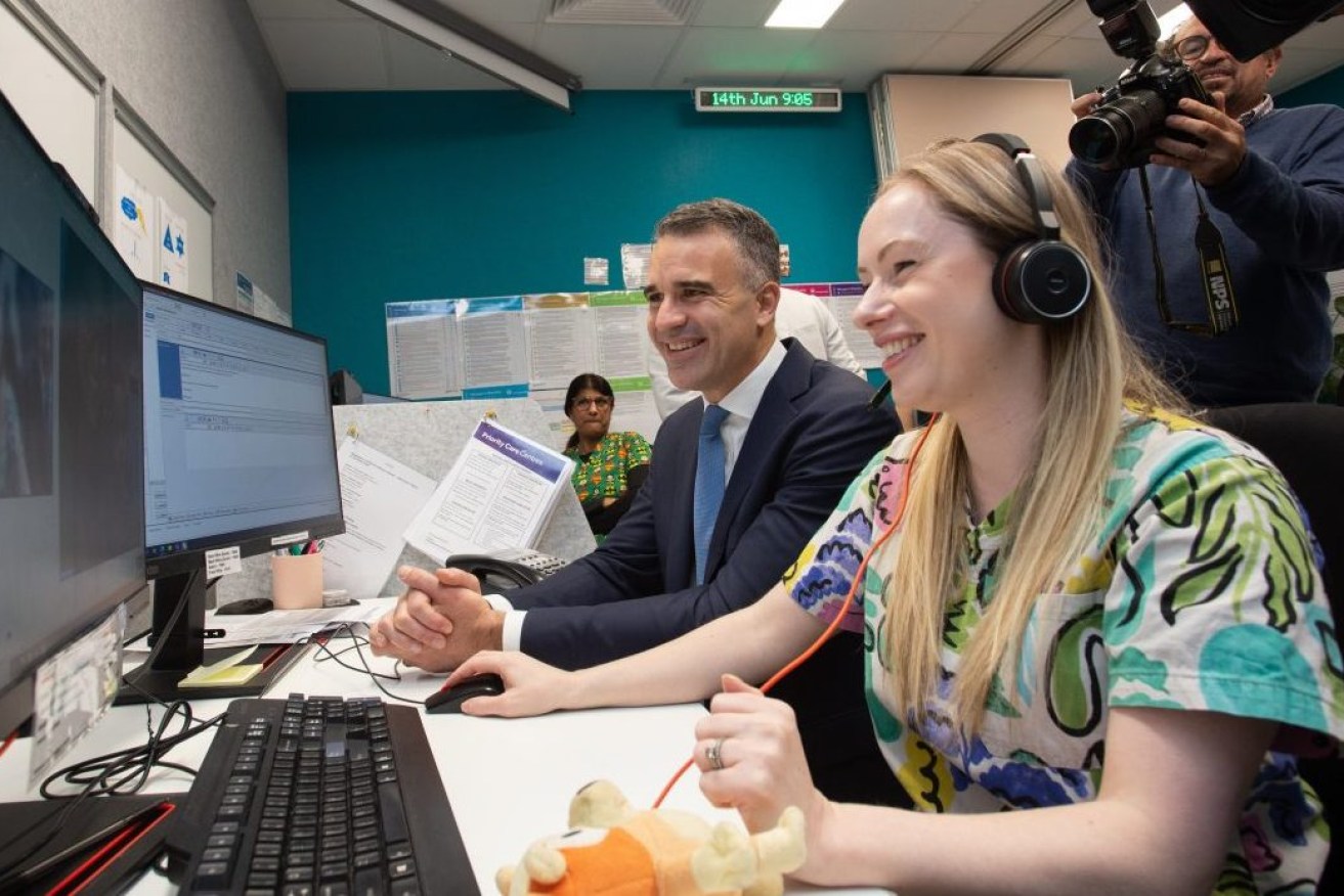 Premier Peter Malinauskas with virtual care nurse consultant Izzy Taylor. Photo: Brett Hartwig/InDaily