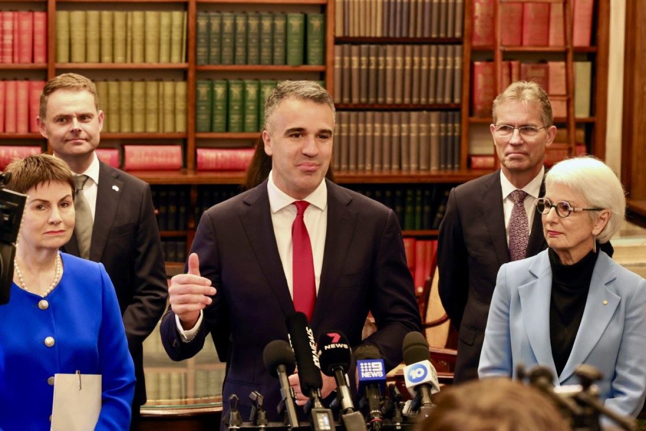(L-R) UniSA chancellor Pauline Carr, Treasurer Stephen Mullighan, Premier Peter Malinauskas, University of Adelaide vice-chancellor Peter Høj and University of Adelaide chancellor Catherine Branson at today's university merger press conference. Photo: Tony Lewis/InDaily