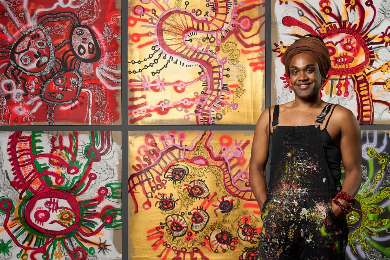 Ramsay Art Prize 2023 finalist and People's Choice winner Zaachariaha Fielding with 'Wonder Drug' at the Art Gallery of South Australia. Photo: Sam Roberts / supplied