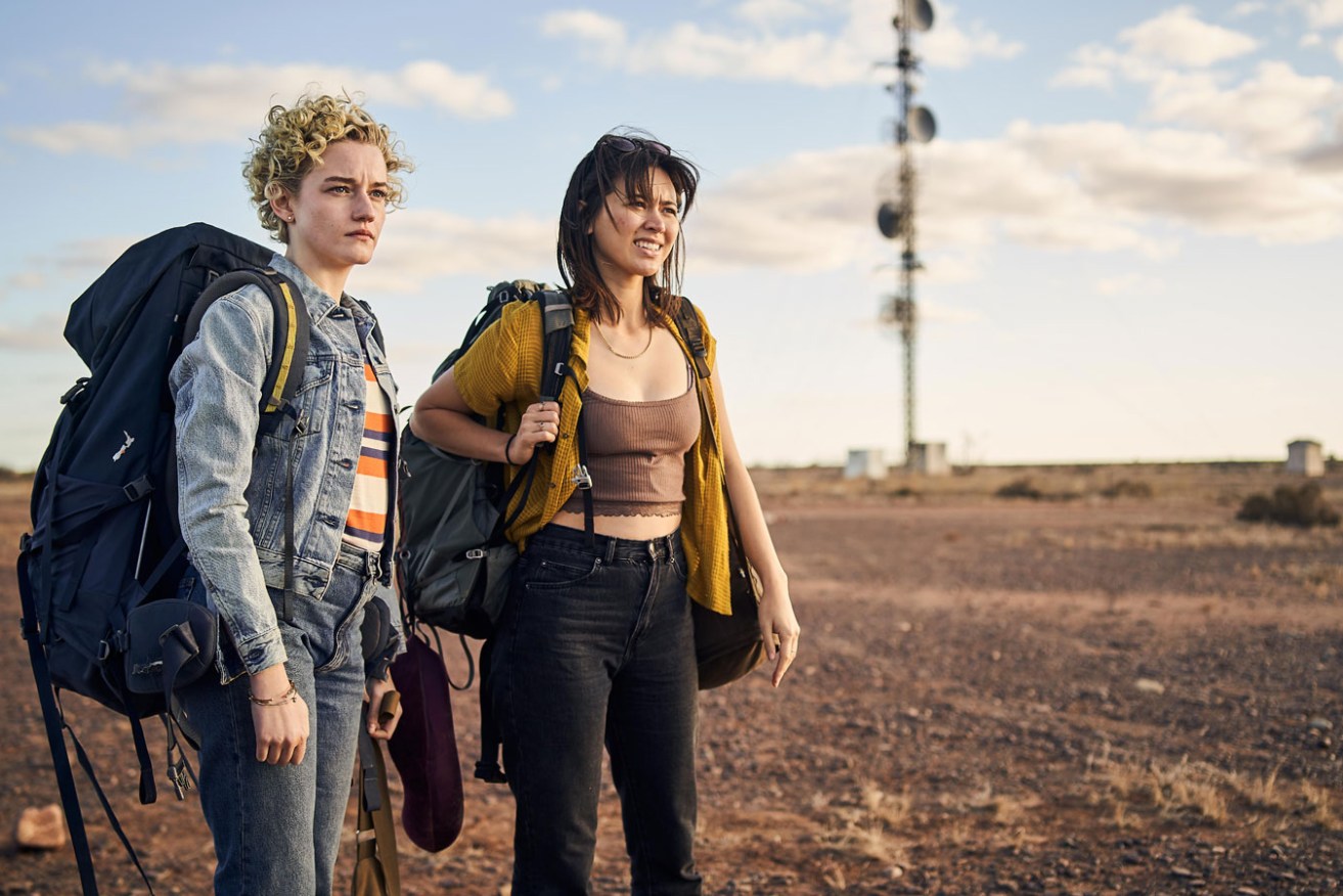 Julia Garner and Jessica Henwick as Hanna and Liv in 'The Royal Hotel'. Photo: See-Saw Films