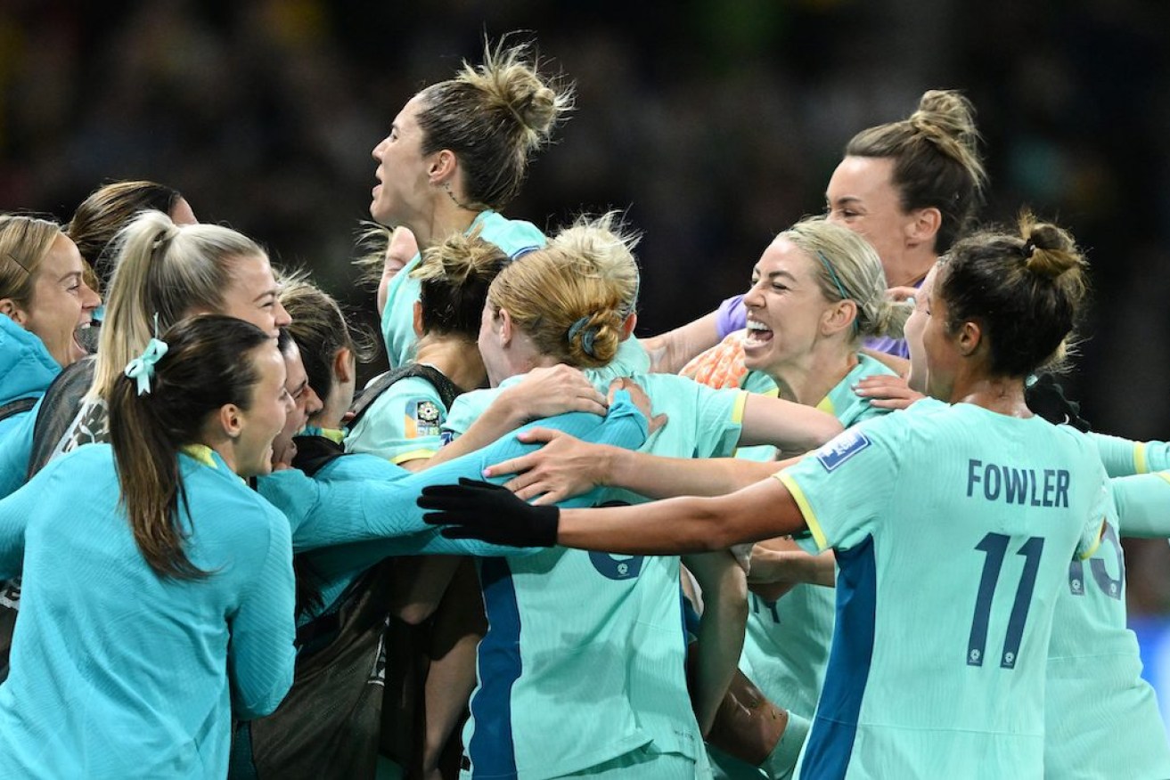 Australia celebrates its win over Canada during the FIFA Women's World Cup 2023 soccer match between Canada and Australia at Melbourne Rectangular Stadium in Melbourne last night. Photo: AAP Image/James Ross