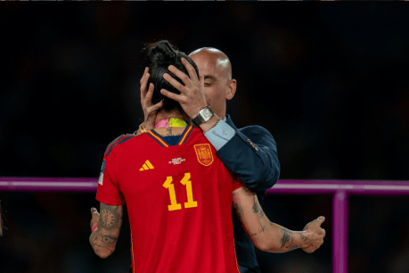 Soccer boss resigns over kiss scandal