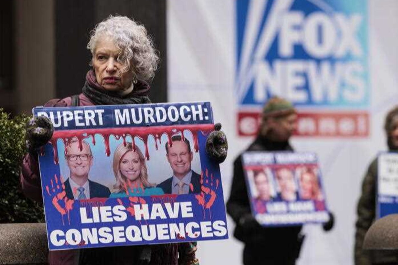 Rise and Resist members outside of Fox News headquarters in New York in February 2023 protesting Murdoch's station promoting false news about the 2020 presidential election. Photo: EPA/JUSTIN LANE.