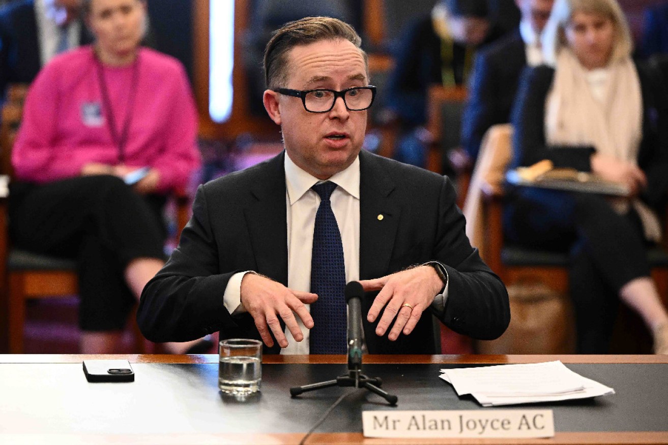 The politics of grievance is on the rise and the behaviour of corporate leaders like Qantas CEO Alan Joyce, pictured at a parliamentary inquiry into the cost of living, isn't helping. Photo: Joel Carrett/AAP