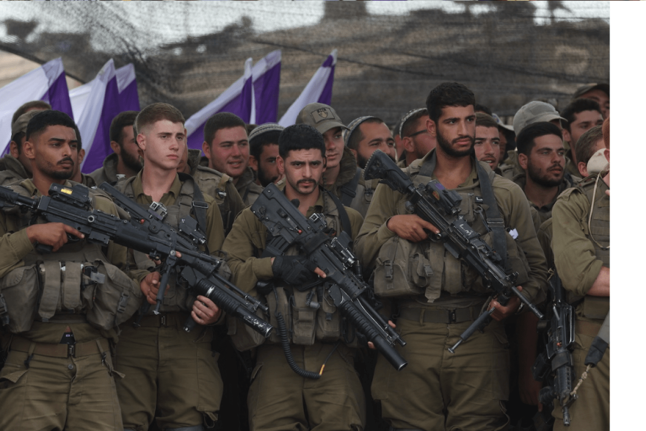 Israeli soldiers on the Gaza border. Photo: Abir Sultan/EBA
