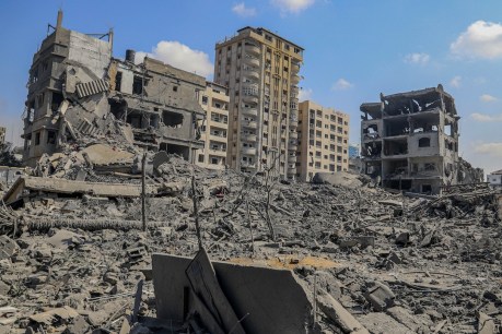 Israel razes Gaza districts despite Hamas threats