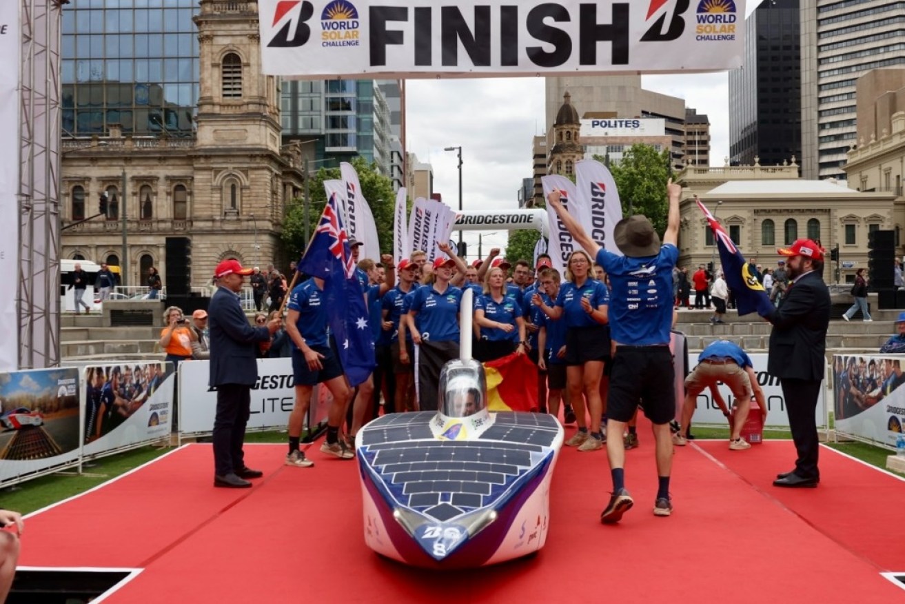 The Innoptus team from Belgium crosses the finish line at noon today in Victoria Square. Photo: Tony Lewis