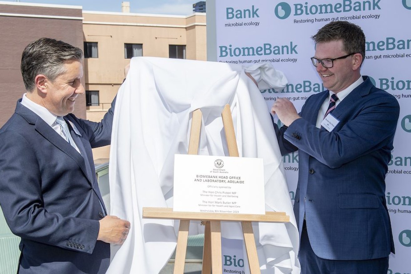 Federal Health Minister Mark Butler (left) and SA Health Minister Chris Picton mark the opening of BiomeBank's new city laboratory. Photo: supplied