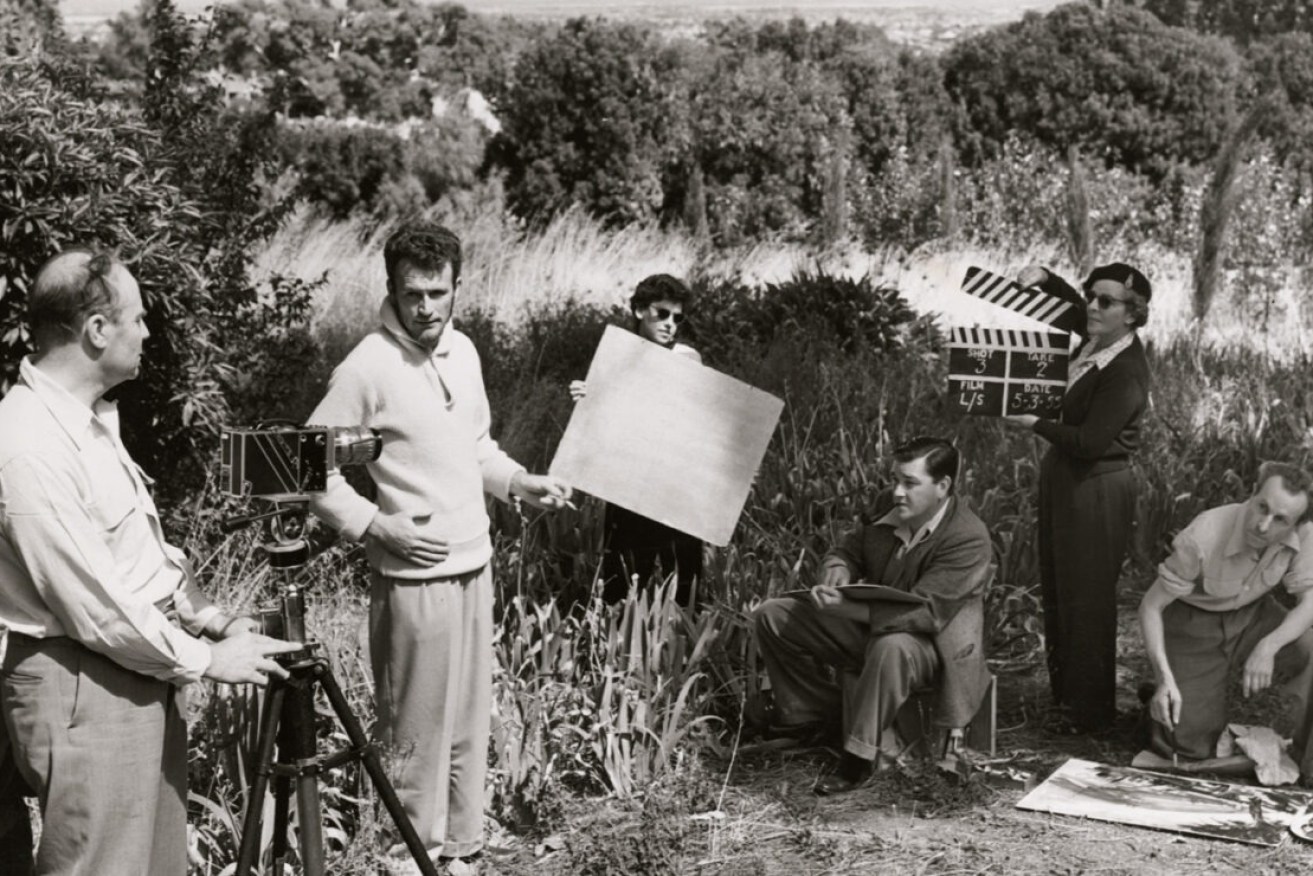 Making the film ‘Painting South Australia, 1950–1955’. From left: J Campbell Dobbie, Stan Ostoja-Kotkowski (director), 'unknown friend with reflector', Douglas Roberts, Kristel (Kitty) Treloar and Mervyn Smith. Photo: Ian Davidson