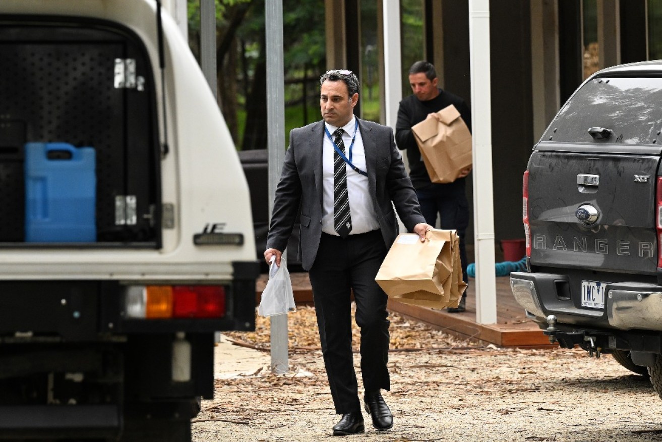 Detectives are seen at the property of Erin Patterson in Leongatha, Victoria, Thursday, November 2, 2023. Erin Patterson has been arrested at her home as part of a probe into suspected mushroom poisoning that left three people dead and another seriously ill. Photo: James Ross/AAP