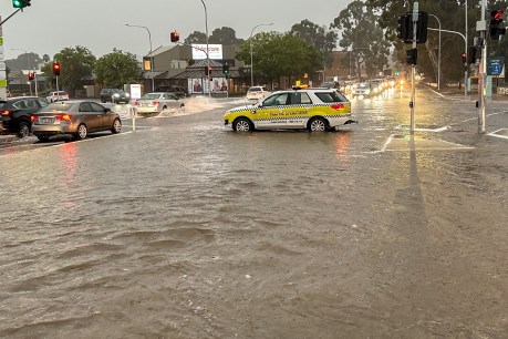 Blackouts and flooded roads as storm hits state