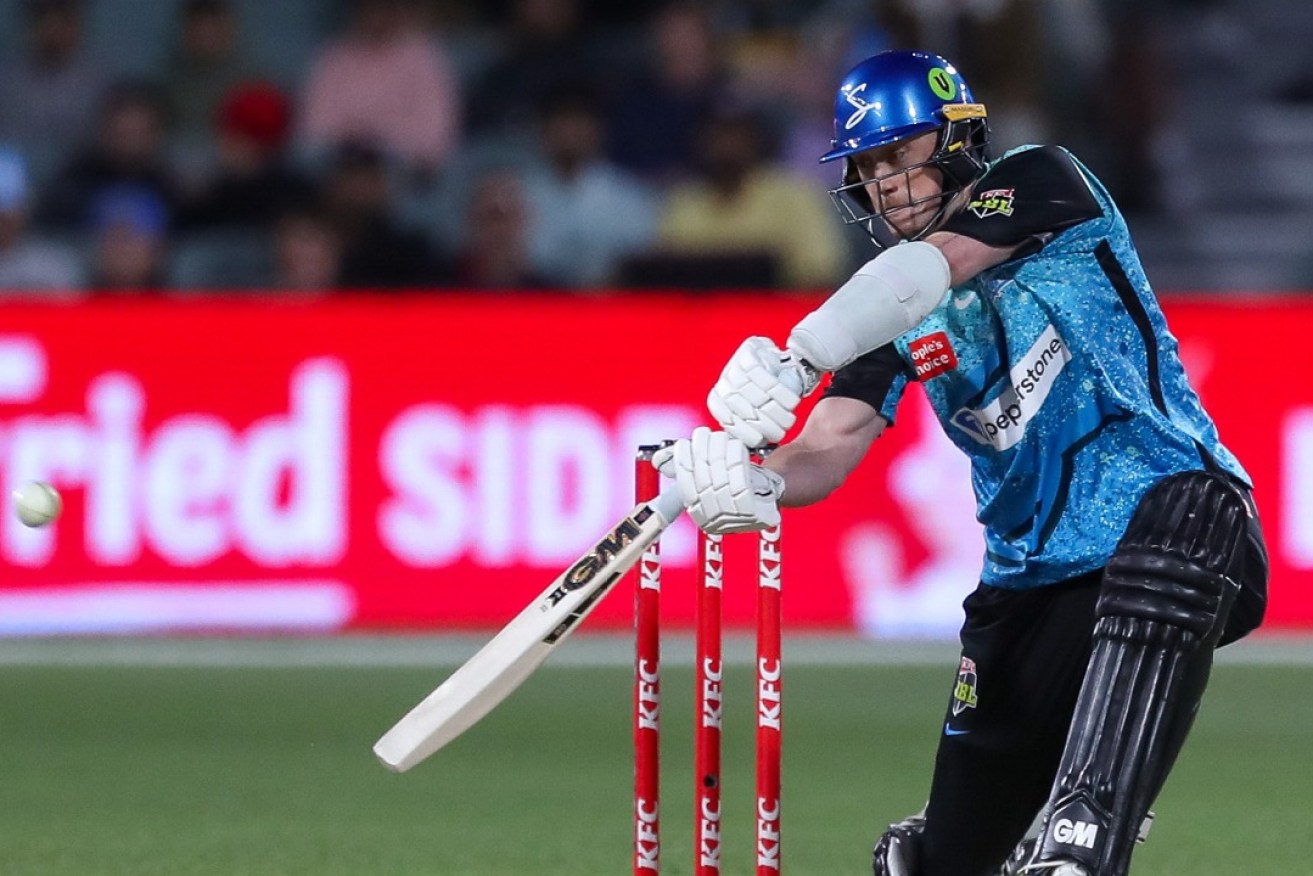 Adam Hose of the Strikers during the BBL match between the Adelaide Strikers and the Sydney Thunder at Adelaide Oval in Adelaide, Tuesday, December 19, 2023. (AAP Image/Matt Turner)