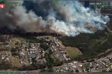 ‘Dangerous, erratic’ bushfire threatens NSW homes