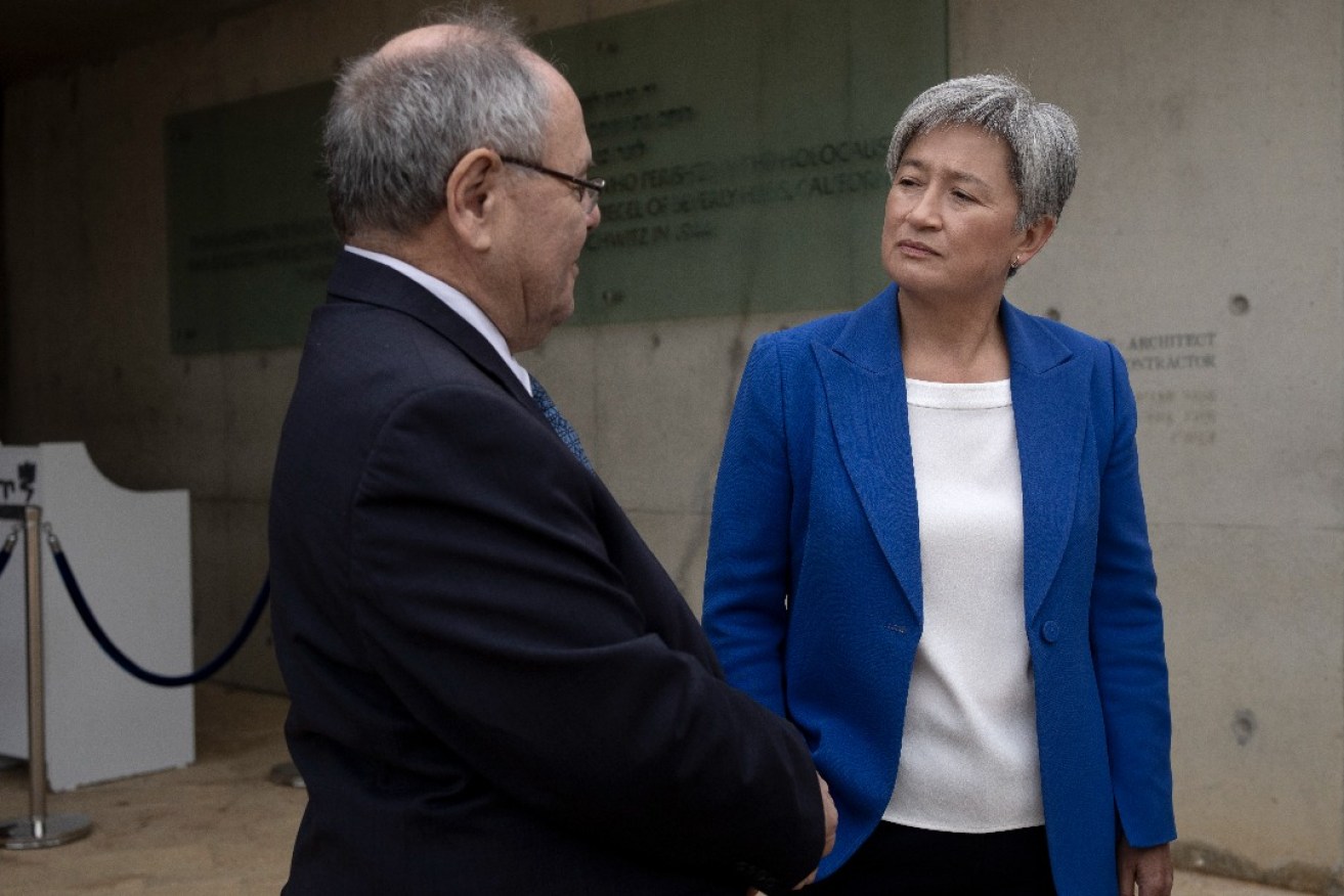 Dani Dayan, Chairman of Yad Vashem, the World Holocaust Remembrance Center, left, and Australian Minister of Foreign Affairs Penny Wong, right, talk following a statement at Yad Vashem at the end of her visit, Wednesday, Jan. 17, 2024. Photo: Maya Alleruzzo/AAP