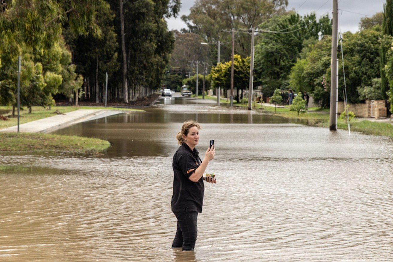 Flooded streets in Seymour. Photo: Diego Fedele/AAP