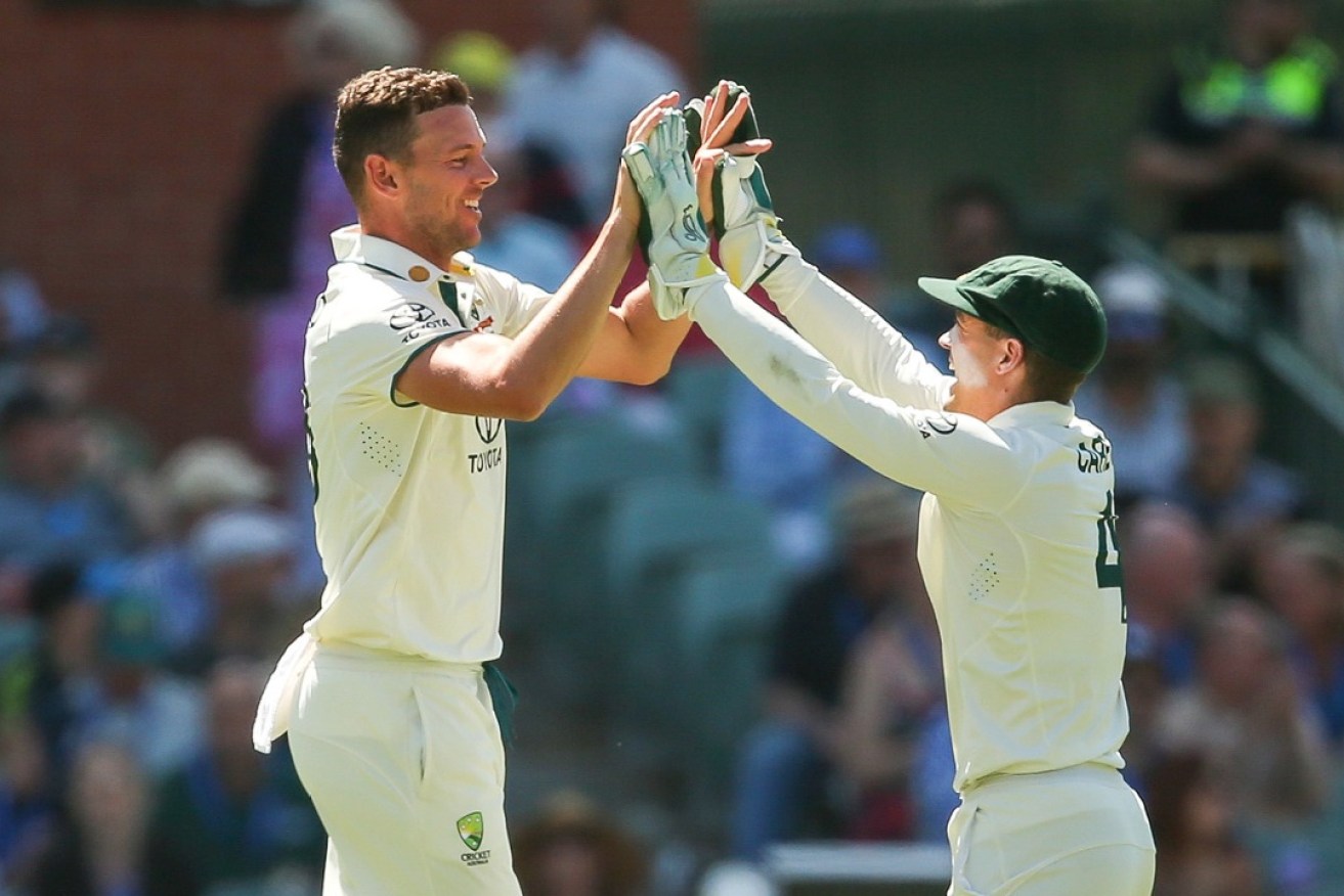 Josh Hazlewood of Australia celebrates a wicket on Day 2 of the First Test between Australia and the West Indies at Adelaide Oval in Adelaide, Thursday, January 18, 2024.  (AAP Image/Matt Turner)
