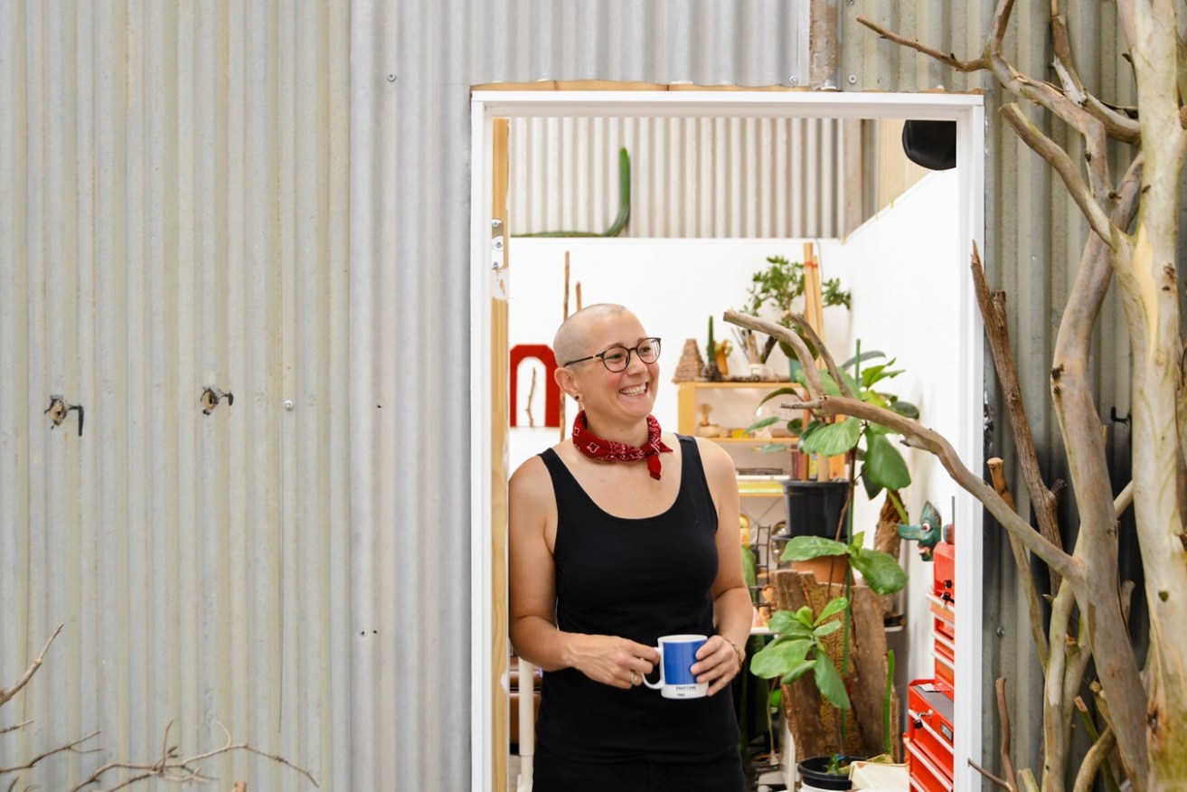 Artist Oakey at the entrance to her Kent Town studio. Photo: Jack Fenby / InReview