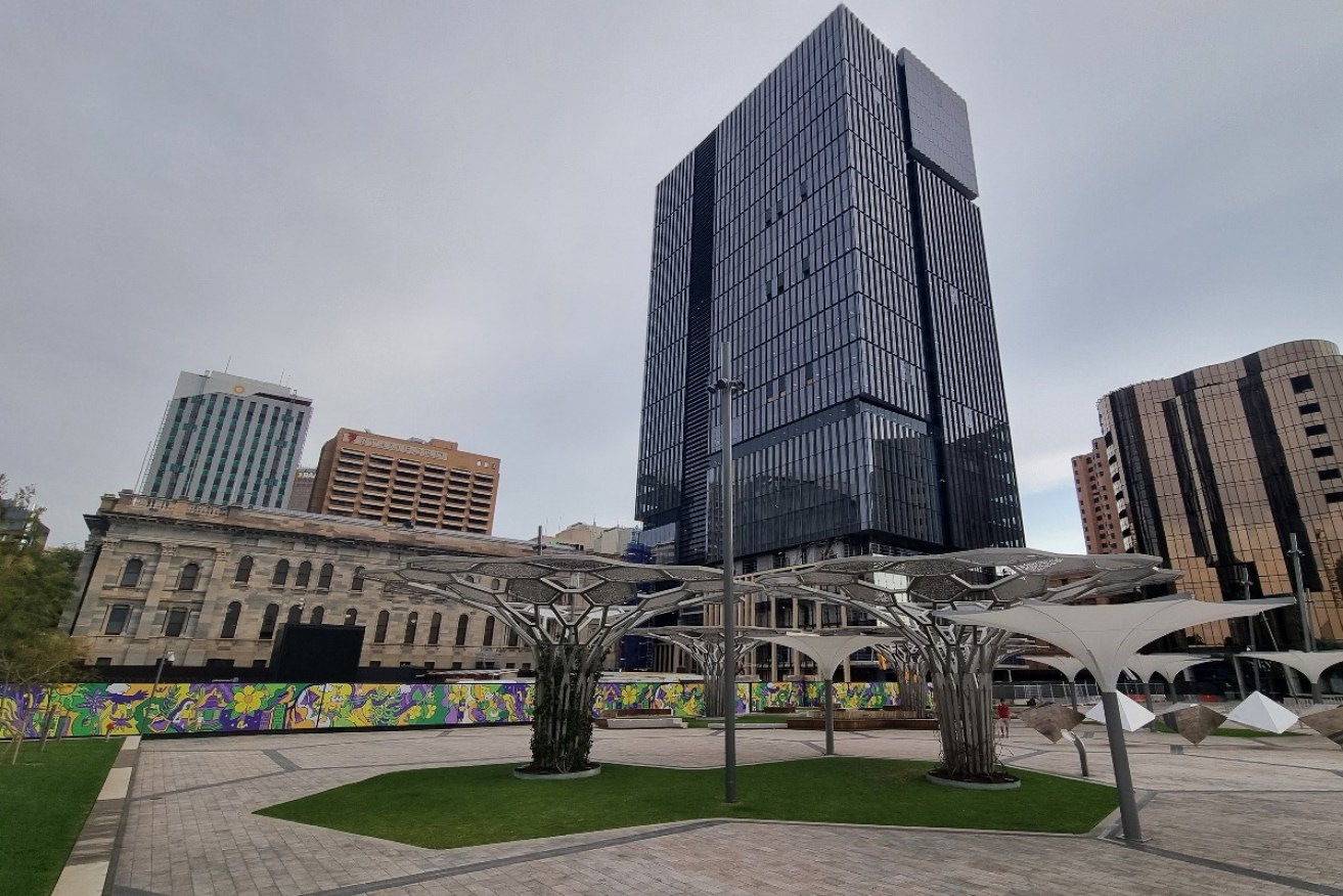 The Malinauskas Government says developer Walker Corporation will build a 38-storey tower to the left of its existing tower on Festival Plaza, behind Parliament House. Photo: Tony Lewis/InDaily