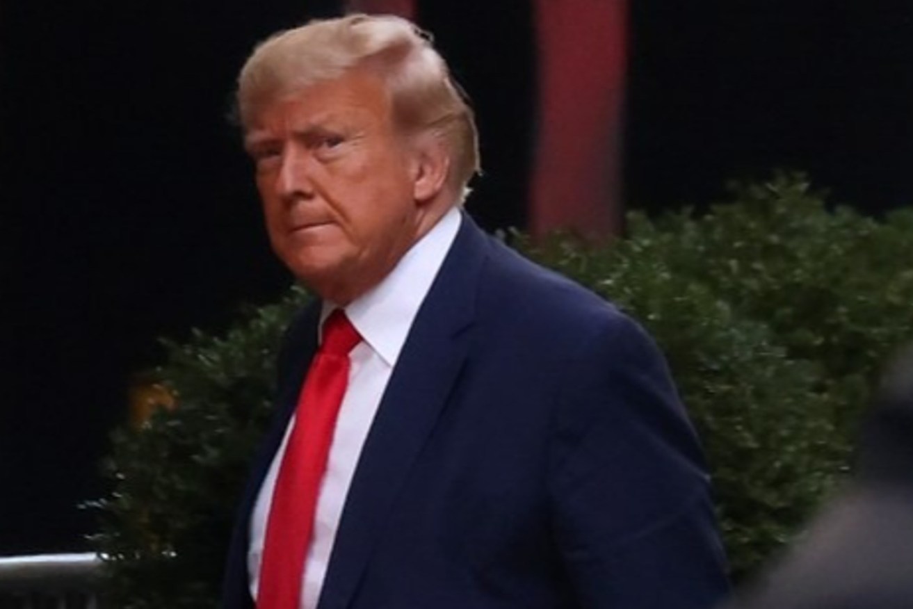 A judge has dismissed a request by Donald Trump to not proceed with a criminal trial on the charge of falsifying business records to cover up payments to a porn star. Photo: AAP