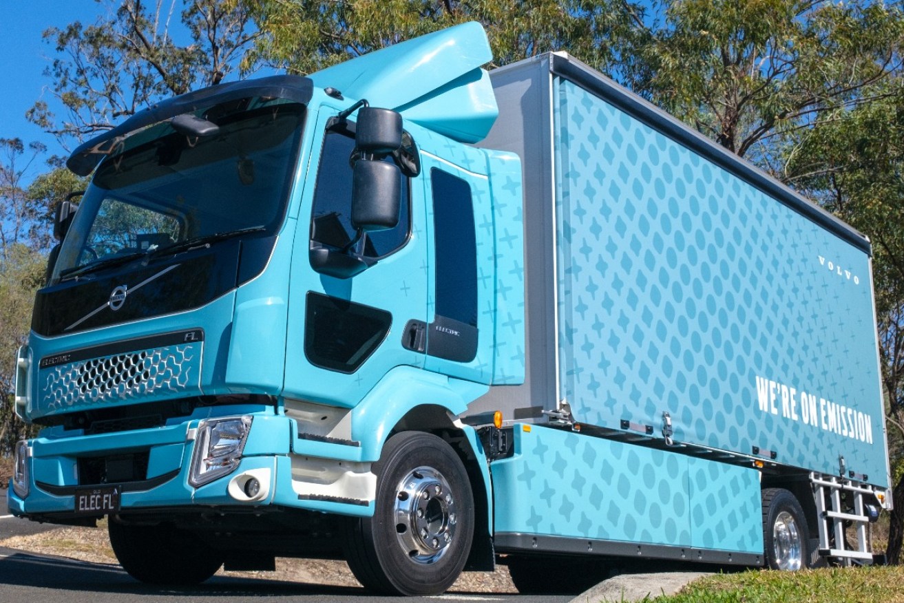 An Australian project will attempt to recharge heavy-duty electric trucks as they drive along regional roads. Photo: AAP