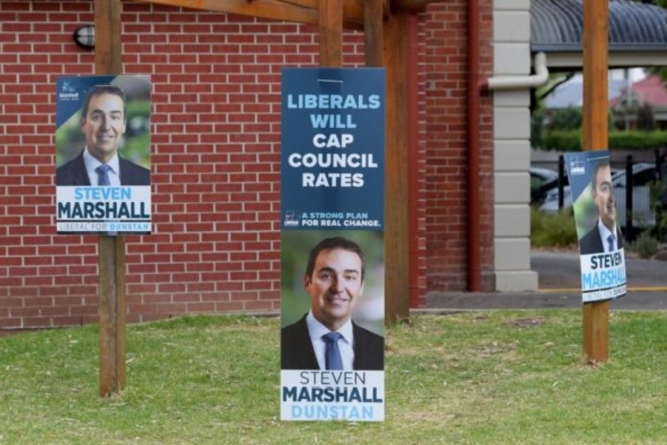 Former premier Steven Marshall campaign posters on election day, 2018. Photo: Tracey Nearmy/AAP