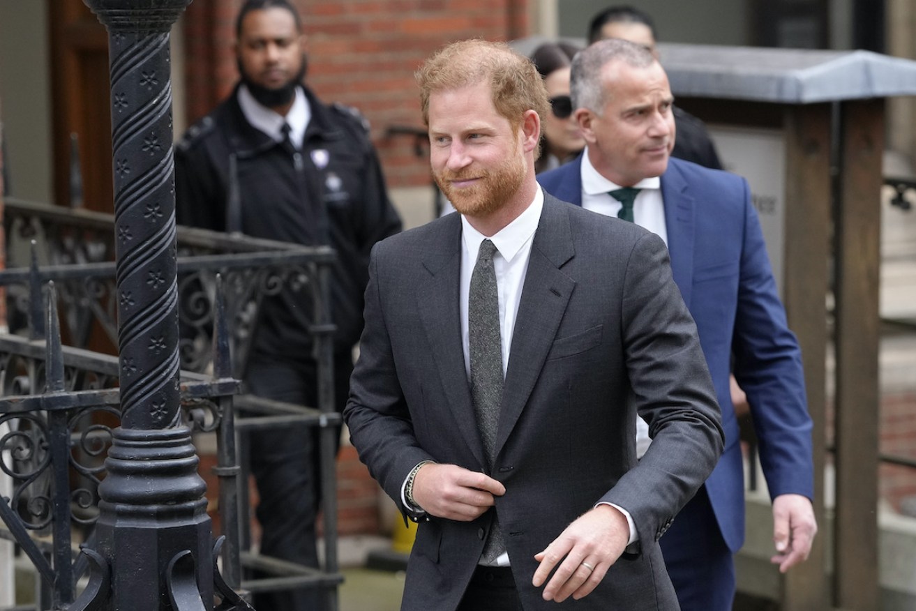 Prince Harry leaves the Royal Courts Of Justice in London in March 2023. Prince Harry's lawyer now says the cover-up of unlawful information gathering at British tabloids owned by Rupert Murdoch went all the way to the top. Photo: AP/Kirsty Wigglesworth