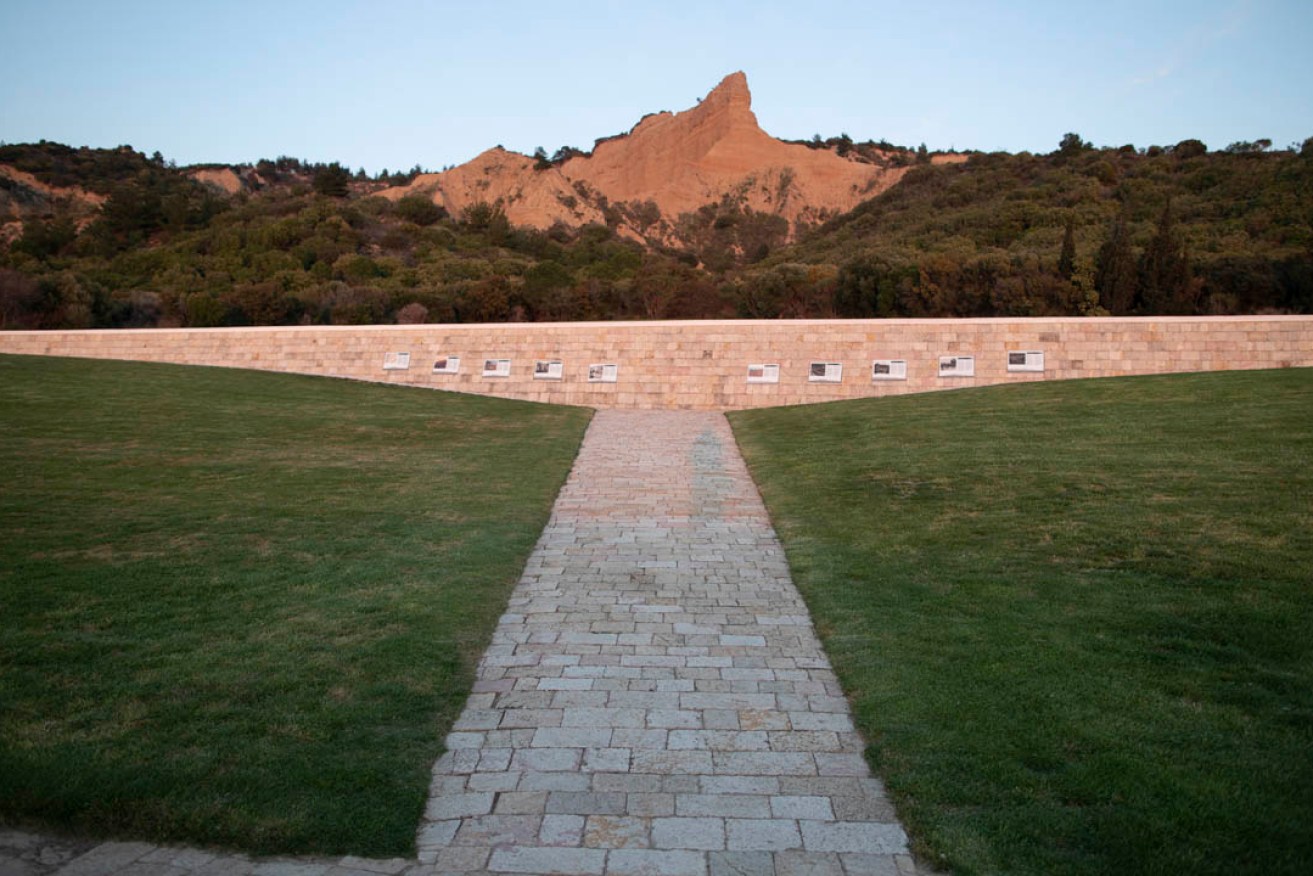 ANZAC Cove on the Gallipoli peninsula during sunset, with the once treacherous cliffs in the background. Photo: EPA/Tolga Bozoglu