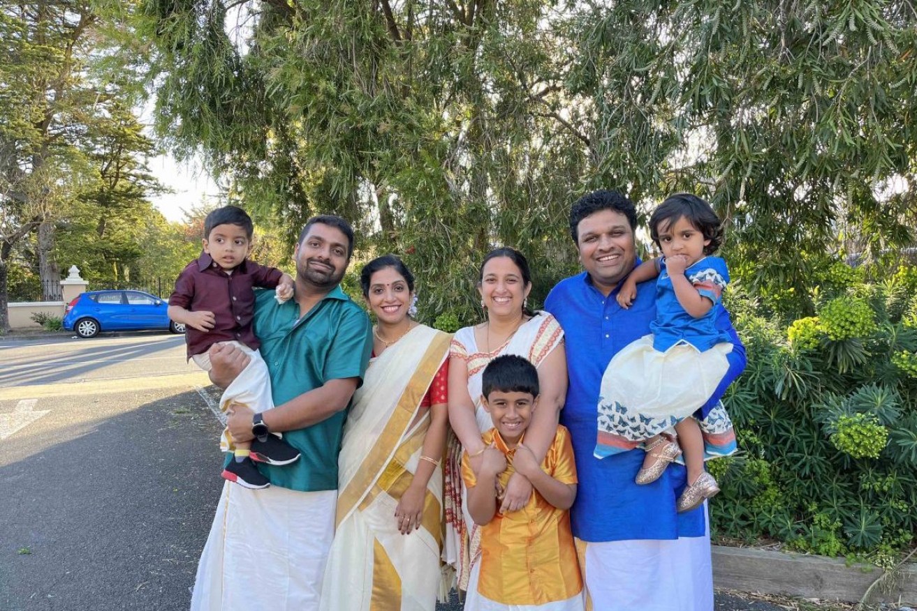 Joseph John and Anumol (R) with his brother James, sister-in-law Stephy and their families