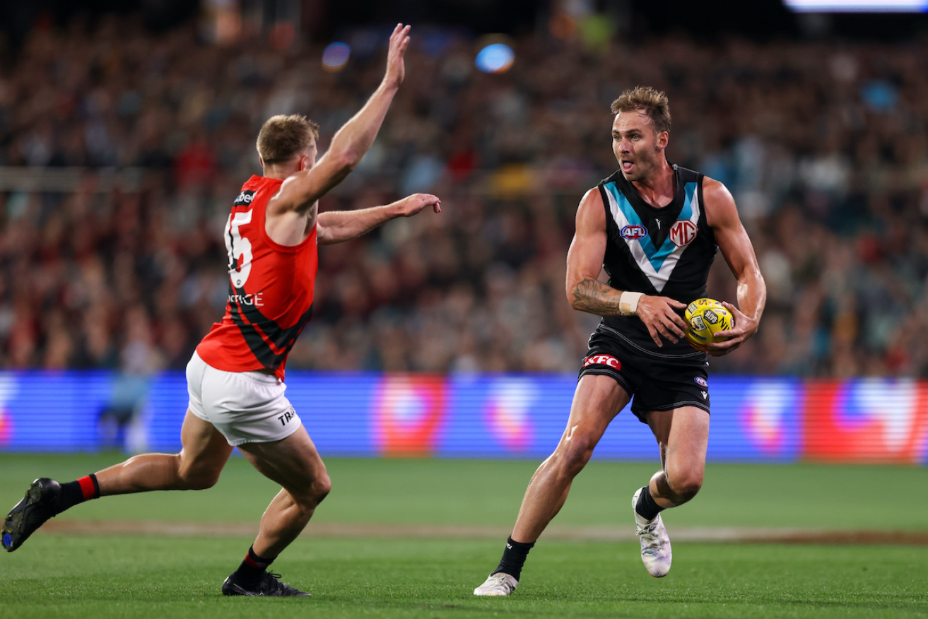 Port Adelaide's Jeremy Finlayson has been handed a three game ban for a homophobic slur during a game against Essendon. Photo: Matt Turner/AAP