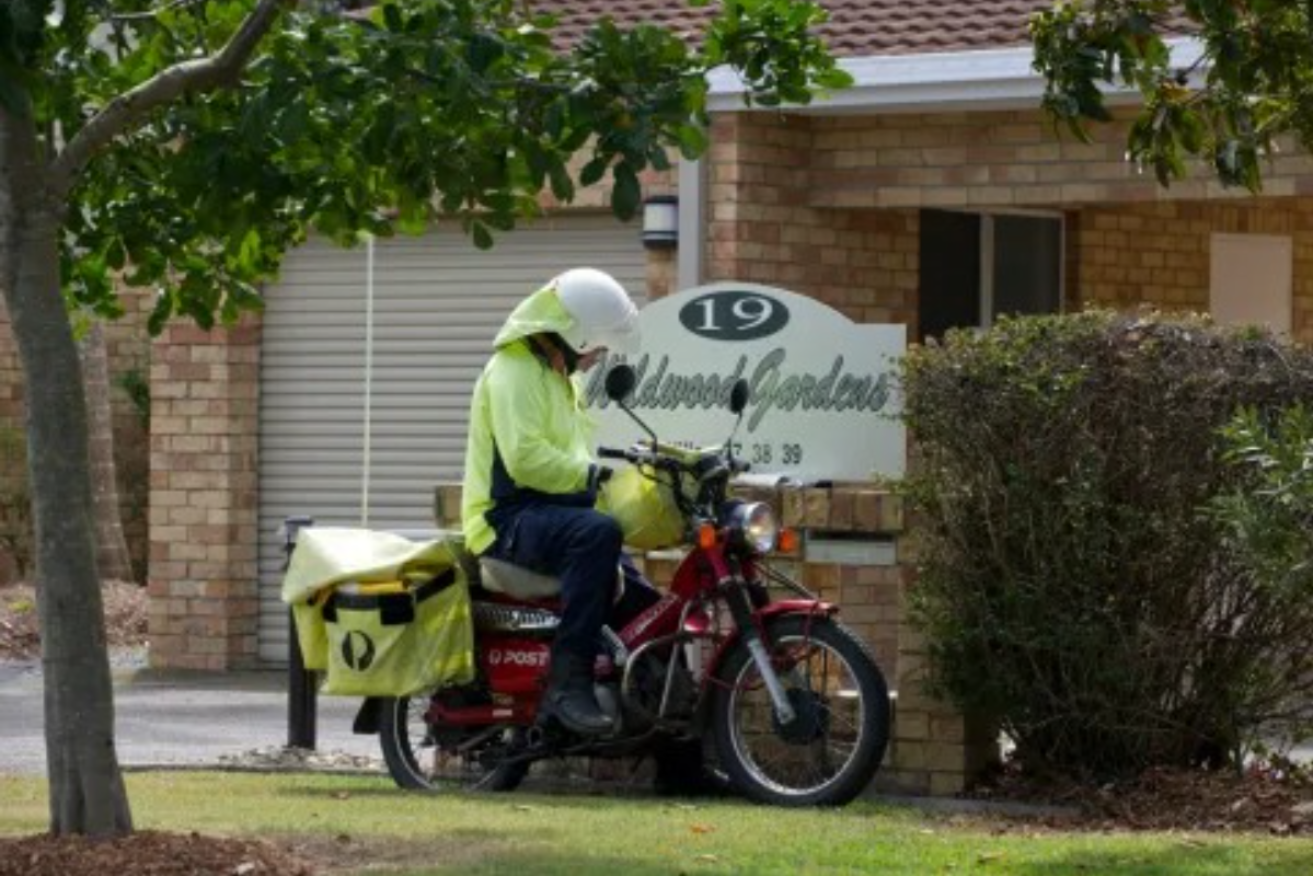 Australia Post will deliver letters every second day from next week. Photo: AAP