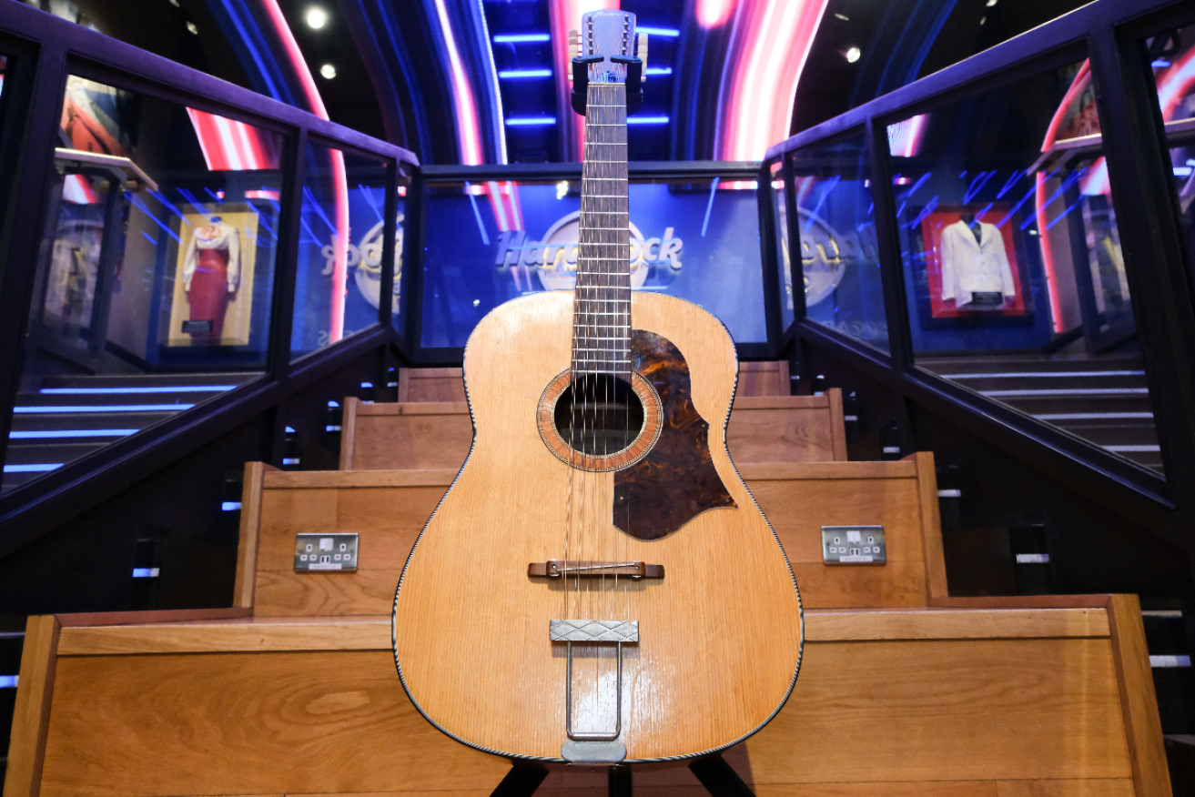 John Lennon’s long-lost Framus 12-string Hootenanny acoustic guitar on display in London before it goes to auction. Photo: Cover Images